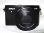  Nikon 1 J4 Kit 10-30  PD VR /